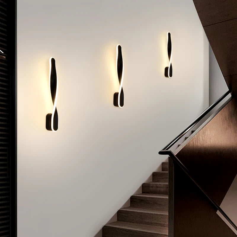 Spiral wall lights along a staircase
